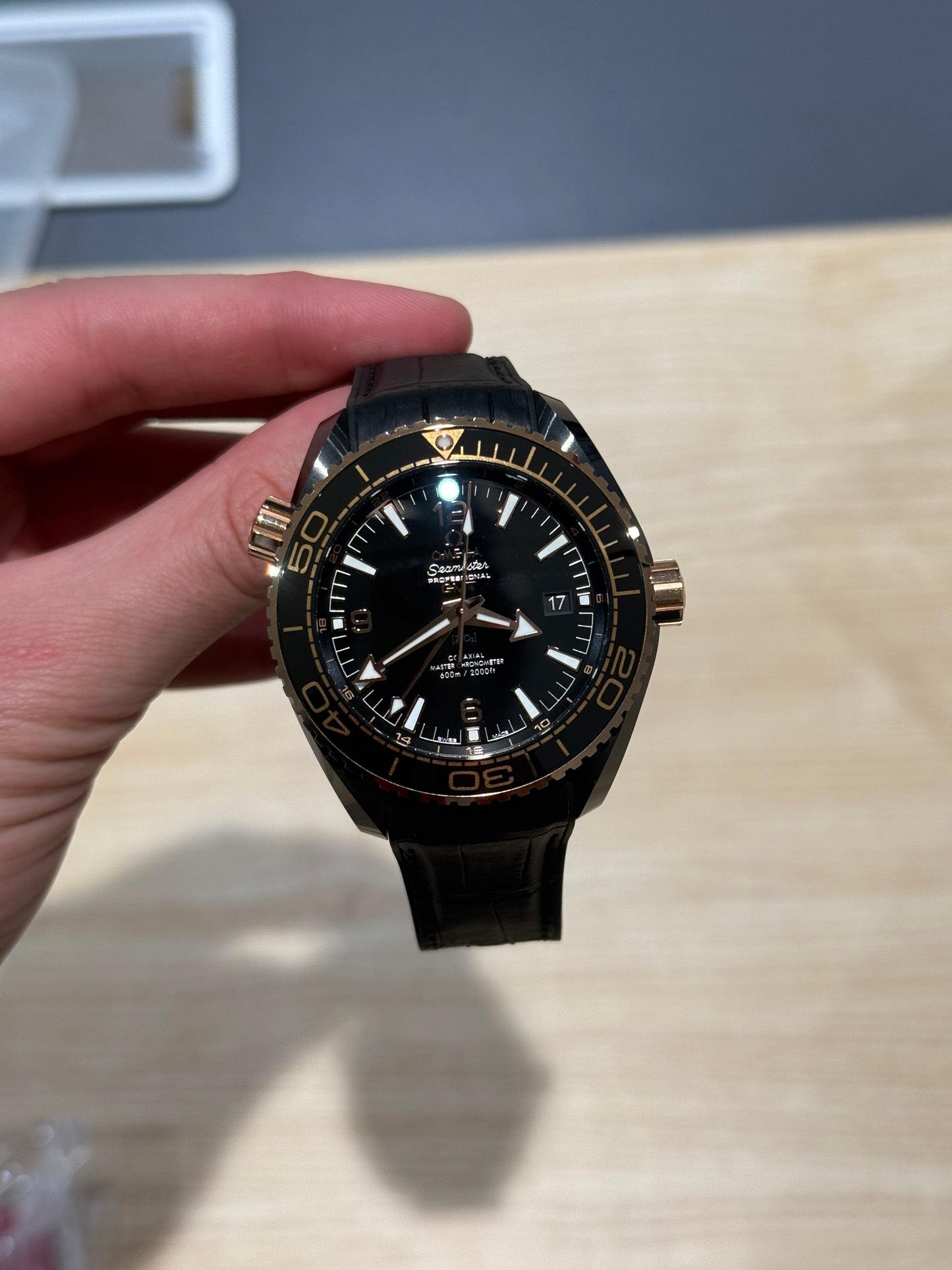 Omega Seamaster Planet Ocean Deep Black Ceramic Sedna Gold Black Leather Strap 215.63.46.22.01.001 Open Card